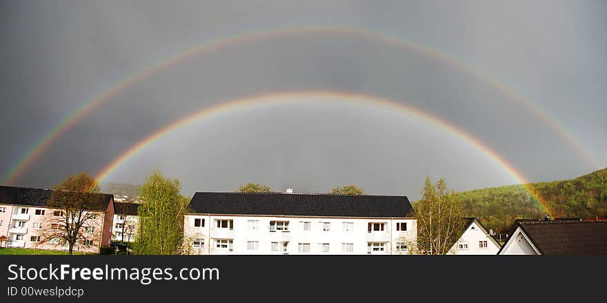 Rainbow and mountains and tree with sky. Rainbow and mountains and tree with sky