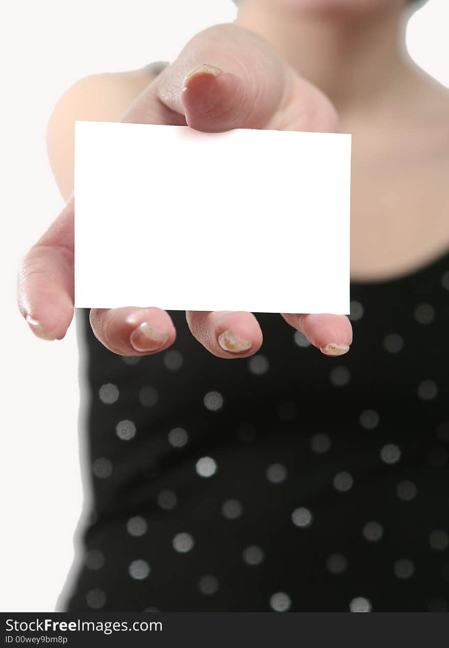 White leaf of a paper in a female hand