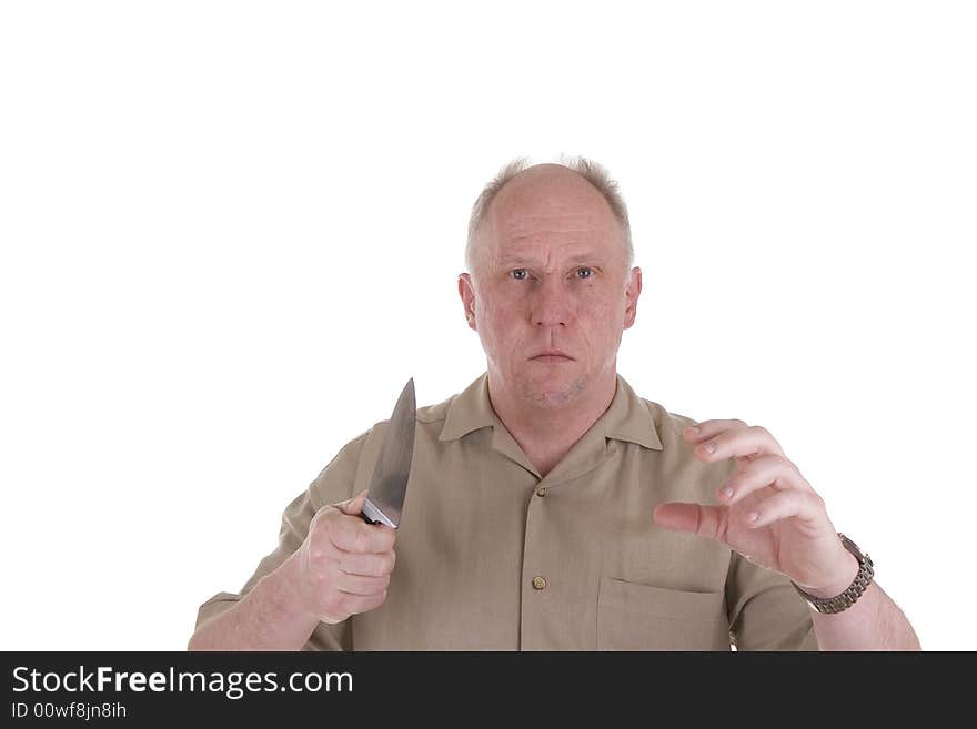 An old guy in a brown shirt attacking with a kife. An old guy in a brown shirt attacking with a kife