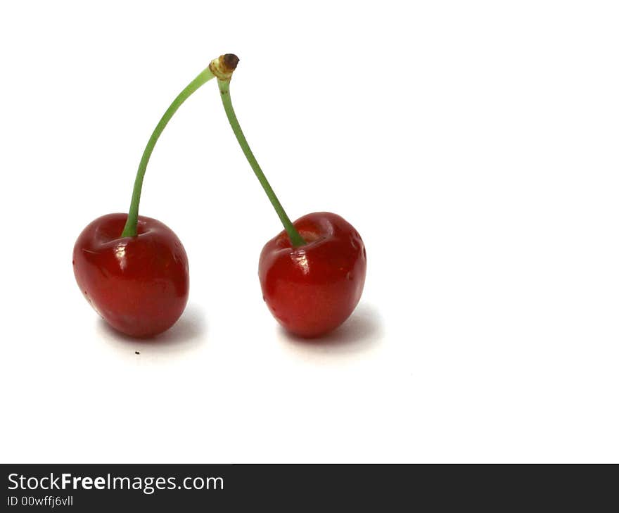 Close up of sweet cherry on white background