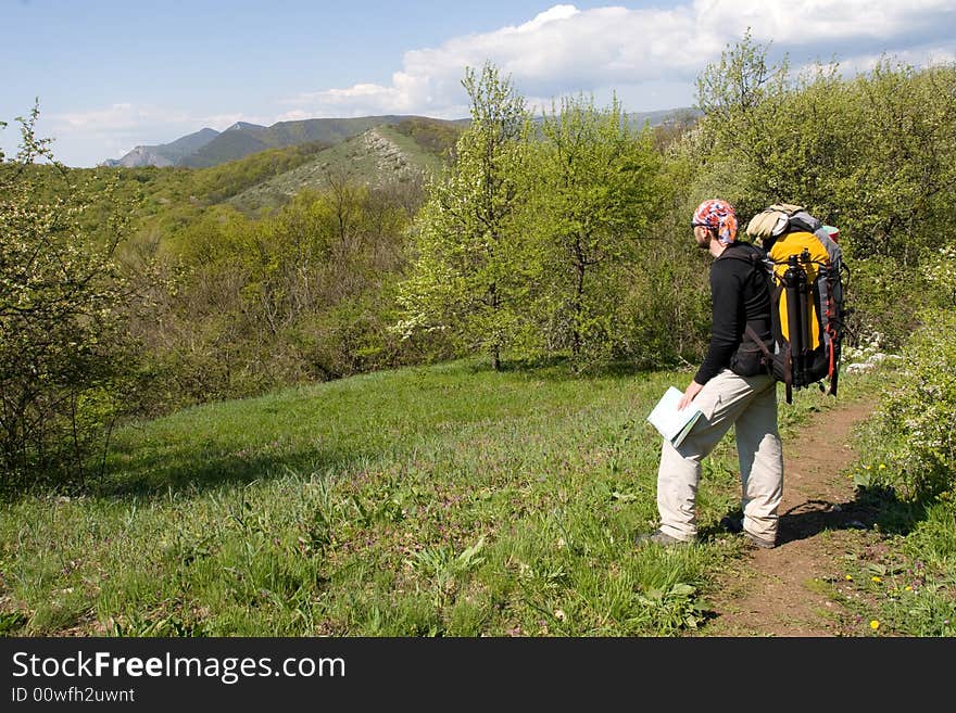 Active people - Person climbing a cliff. Active people - Person climbing a cliff