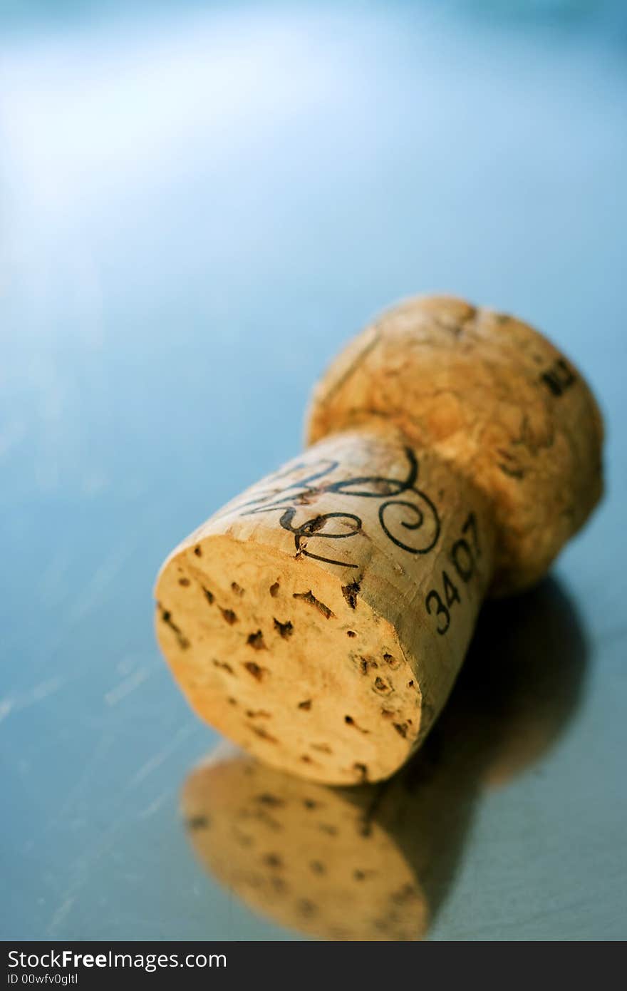 Cork of luxury champagne on metal background. Cork of luxury champagne on metal background