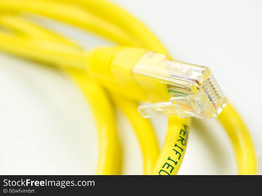 Yellow Computer Network Cable on White background