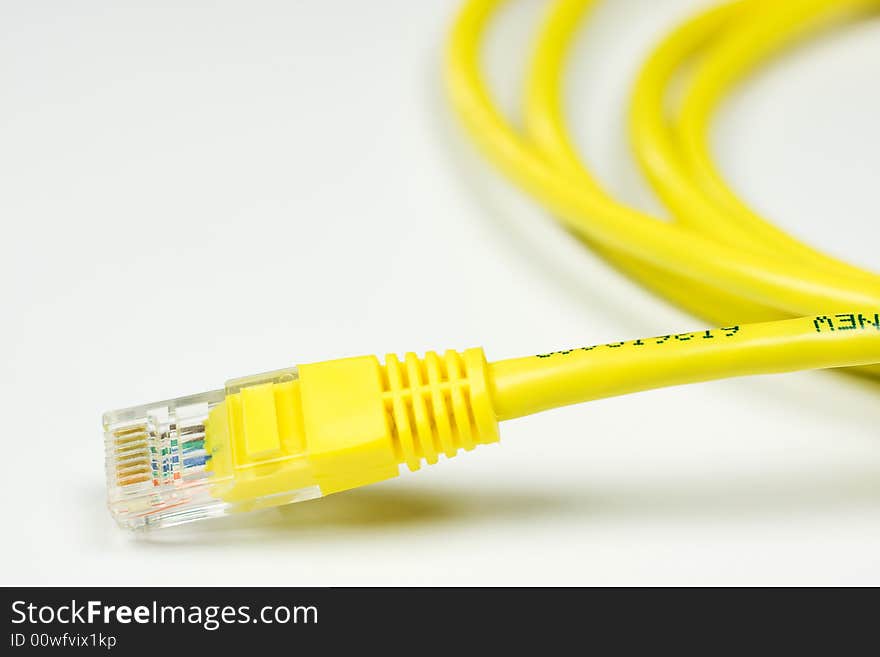 Yellow Computer Network Cable on White background