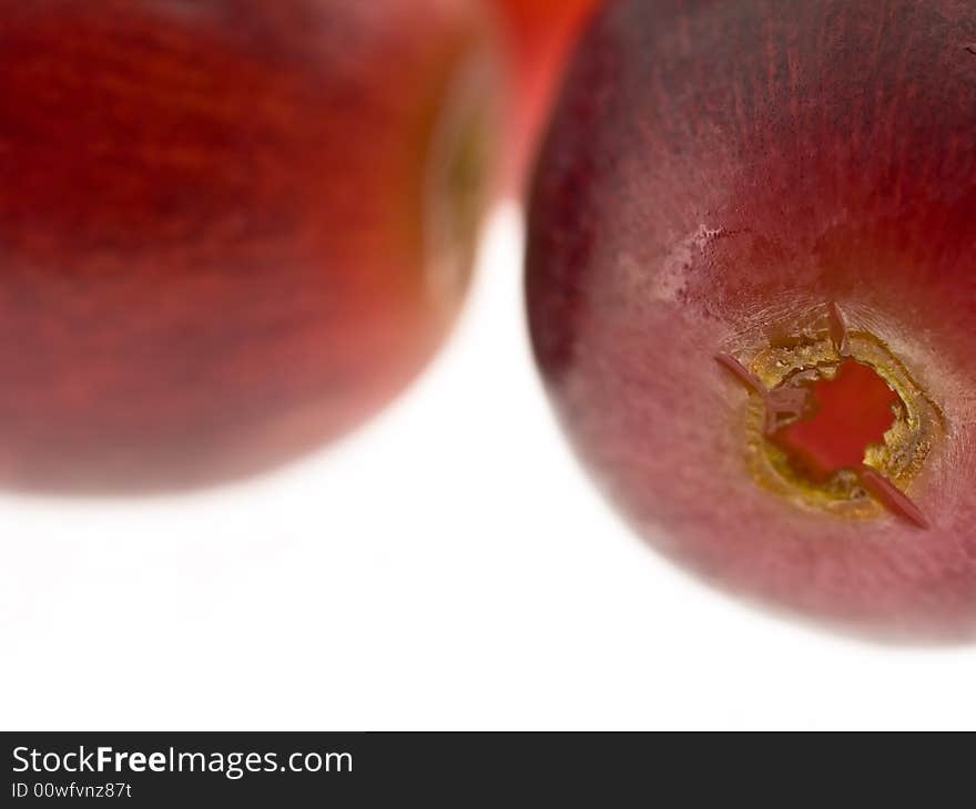 Red grapes macro isolated against white background. Red grapes macro isolated against white background