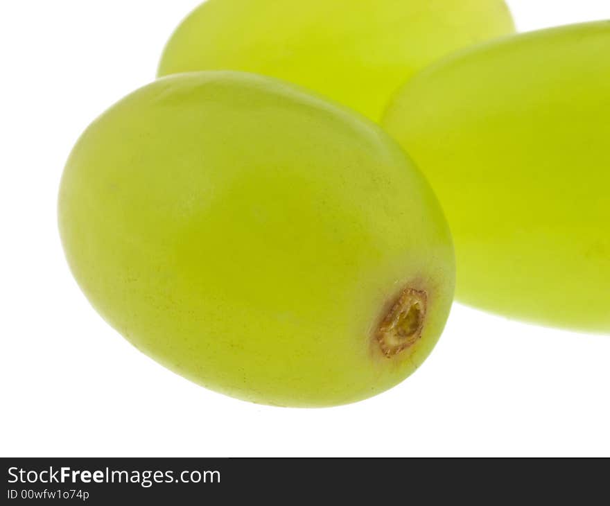 Green grapes macro isolated against white background. Green grapes macro isolated against white background