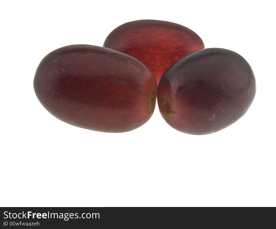 Red grapes macro isolated against white background. Red grapes macro isolated against white background