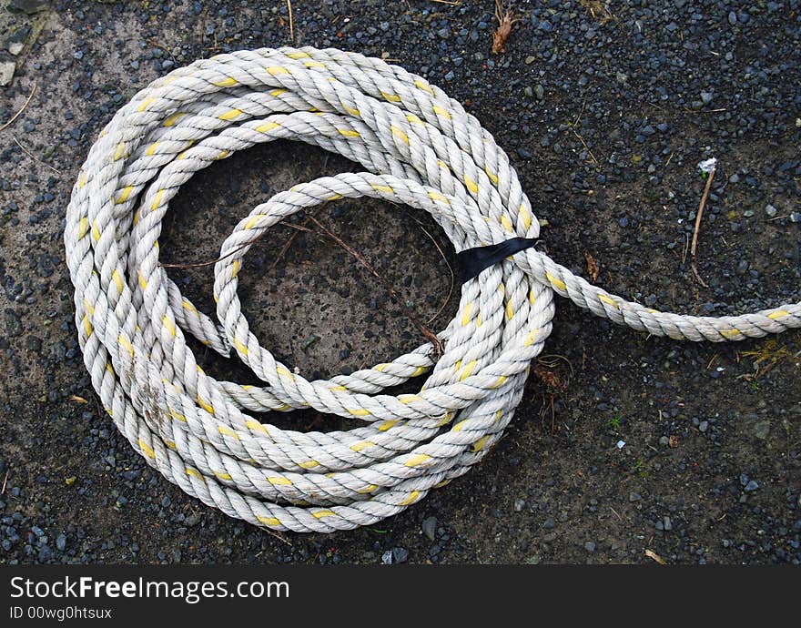 Coiled rope on gravel