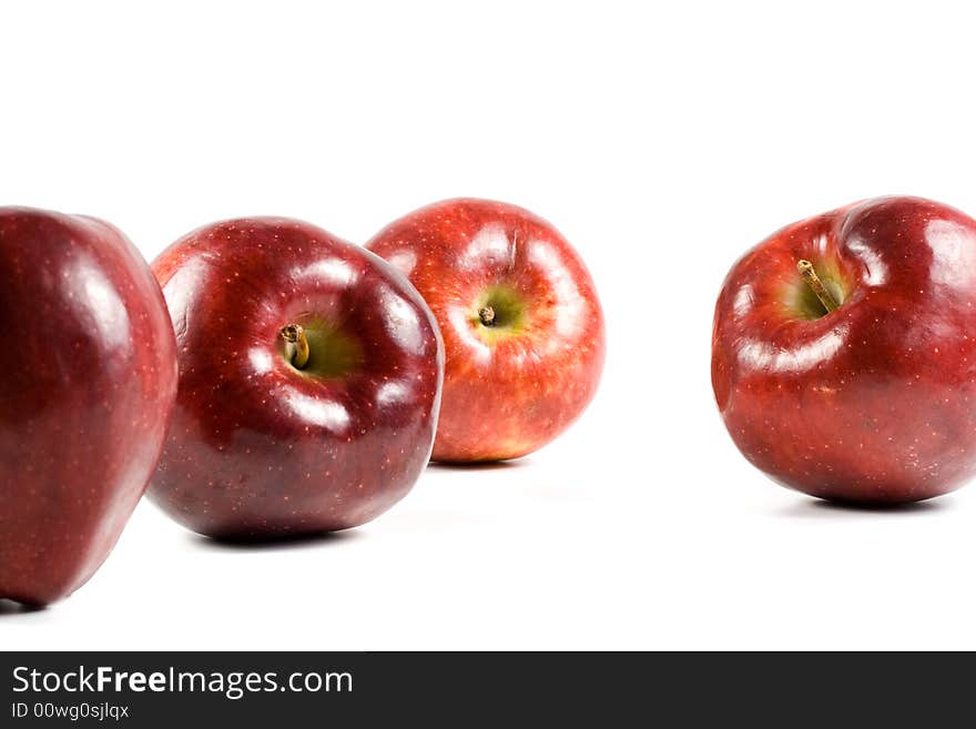 Fresh red apples isolated on a white background