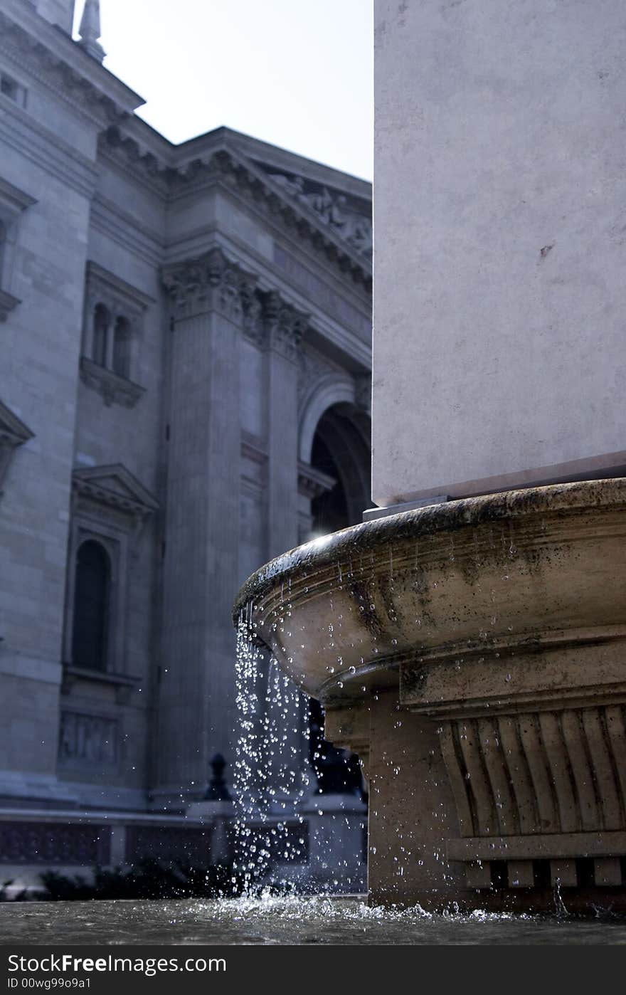 Cathedral and fountain with waterdrops