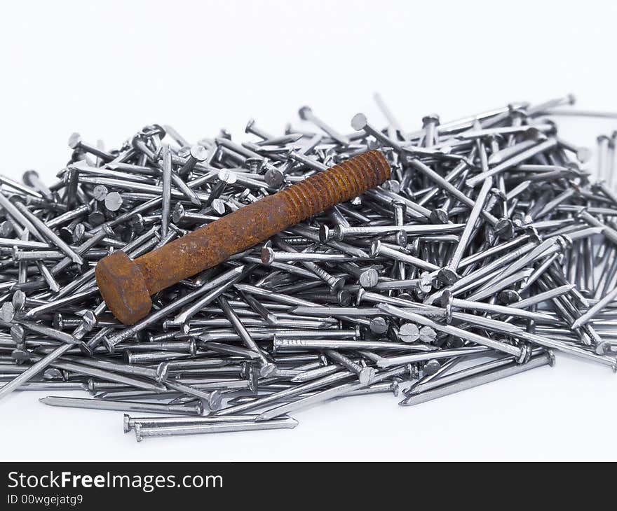 Rusty bolt and metal nails. Rusty bolt and metal nails