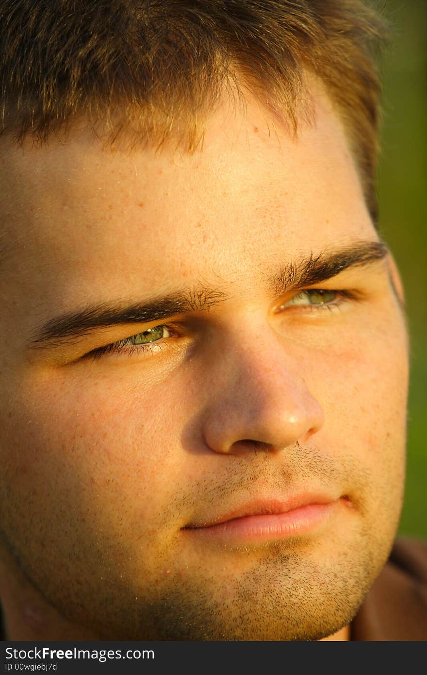 Headshot of a young Caucasian male. Headshot of a young Caucasian male.