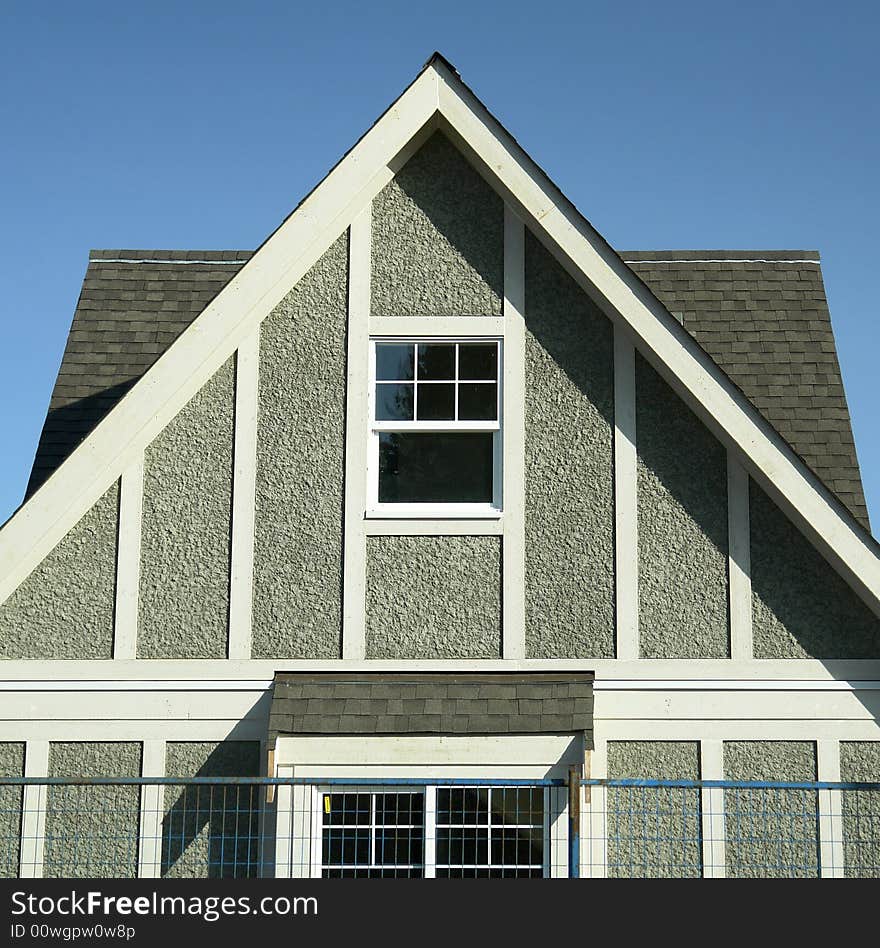 Stucco gable detail on a new home under construction. Stucco gable detail on a new home under construction