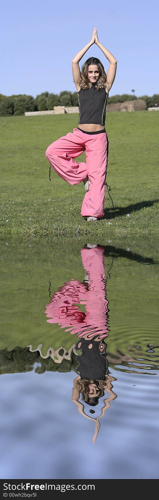 Woman in meditation at the park