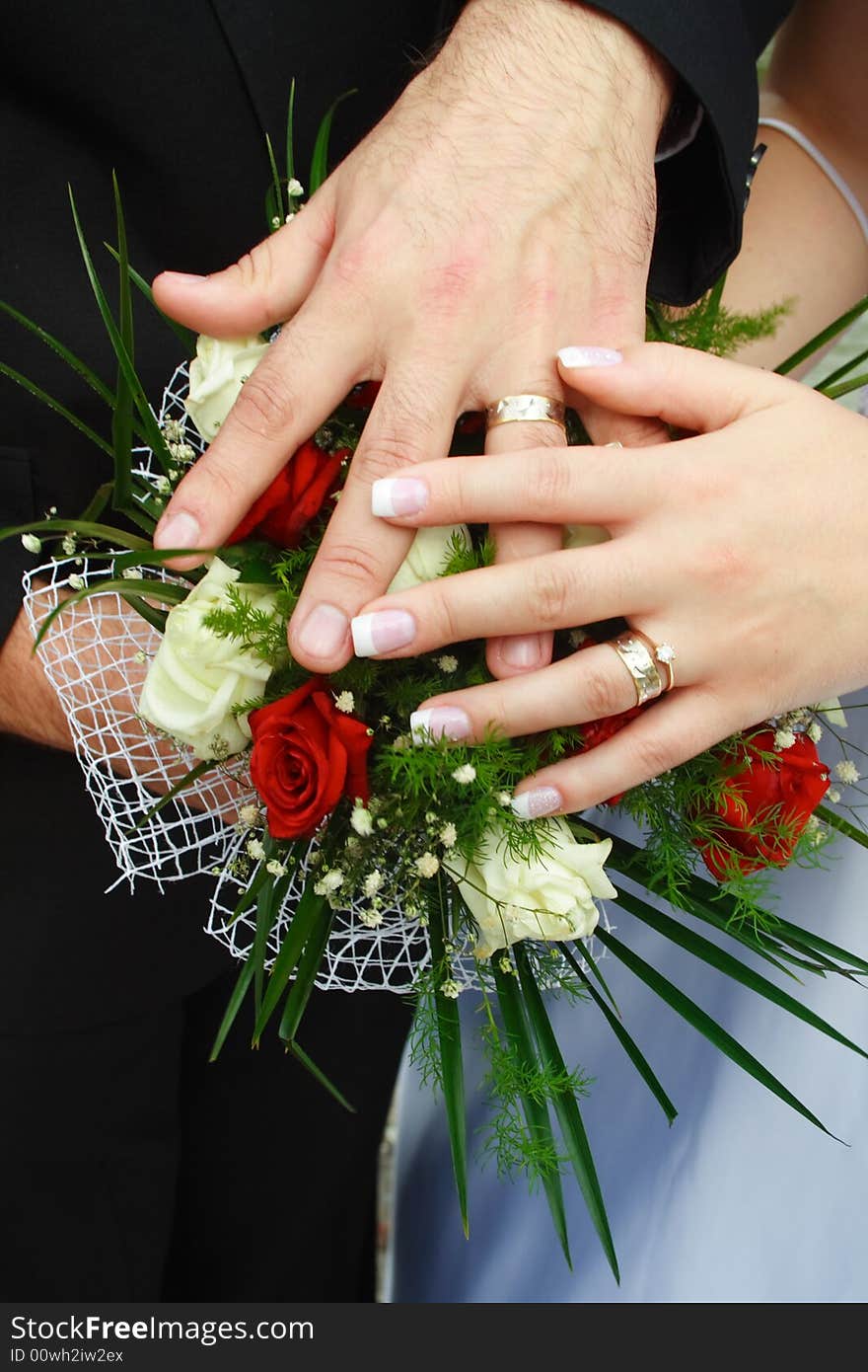 Just Married. Newly weds and bridal bouquet