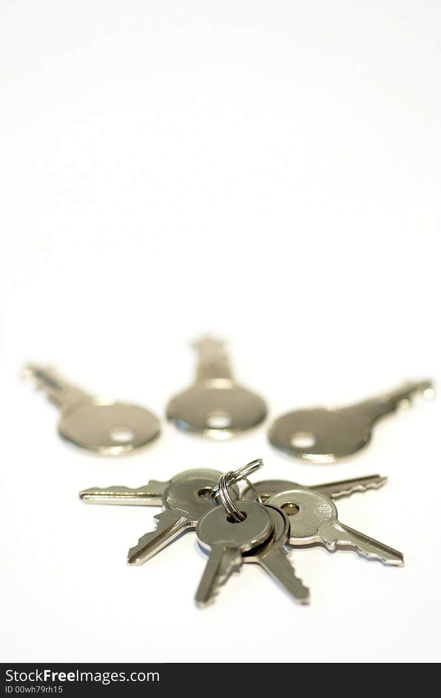 Keys of white background close up