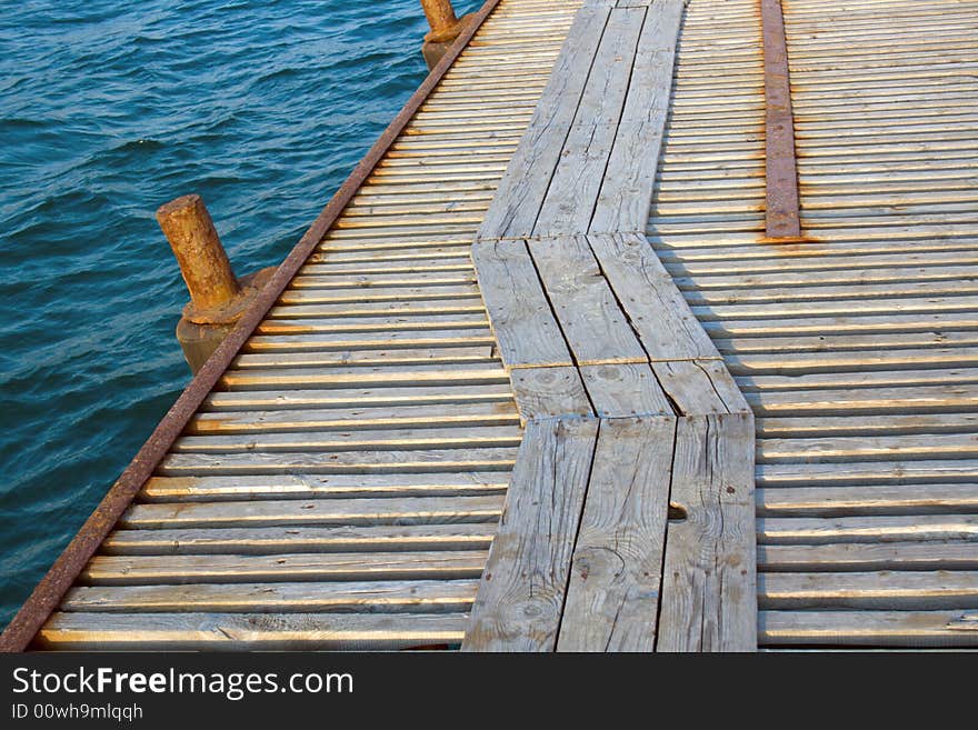 Wooden footbridge in a sea