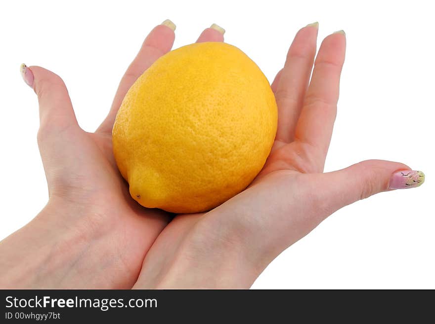 Lemon and woman hands on a white background. Lemon and woman hands on a white background