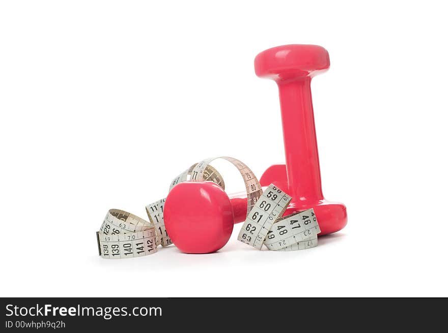 Dumbells and tape measure on a white background