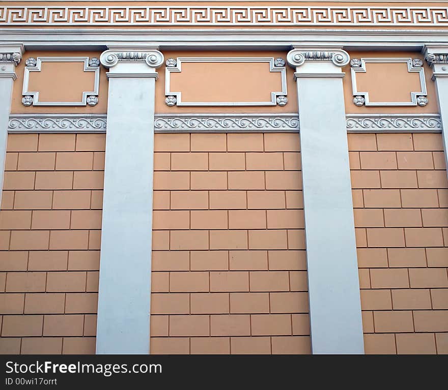 Wall of a building decorated by the Roman columns