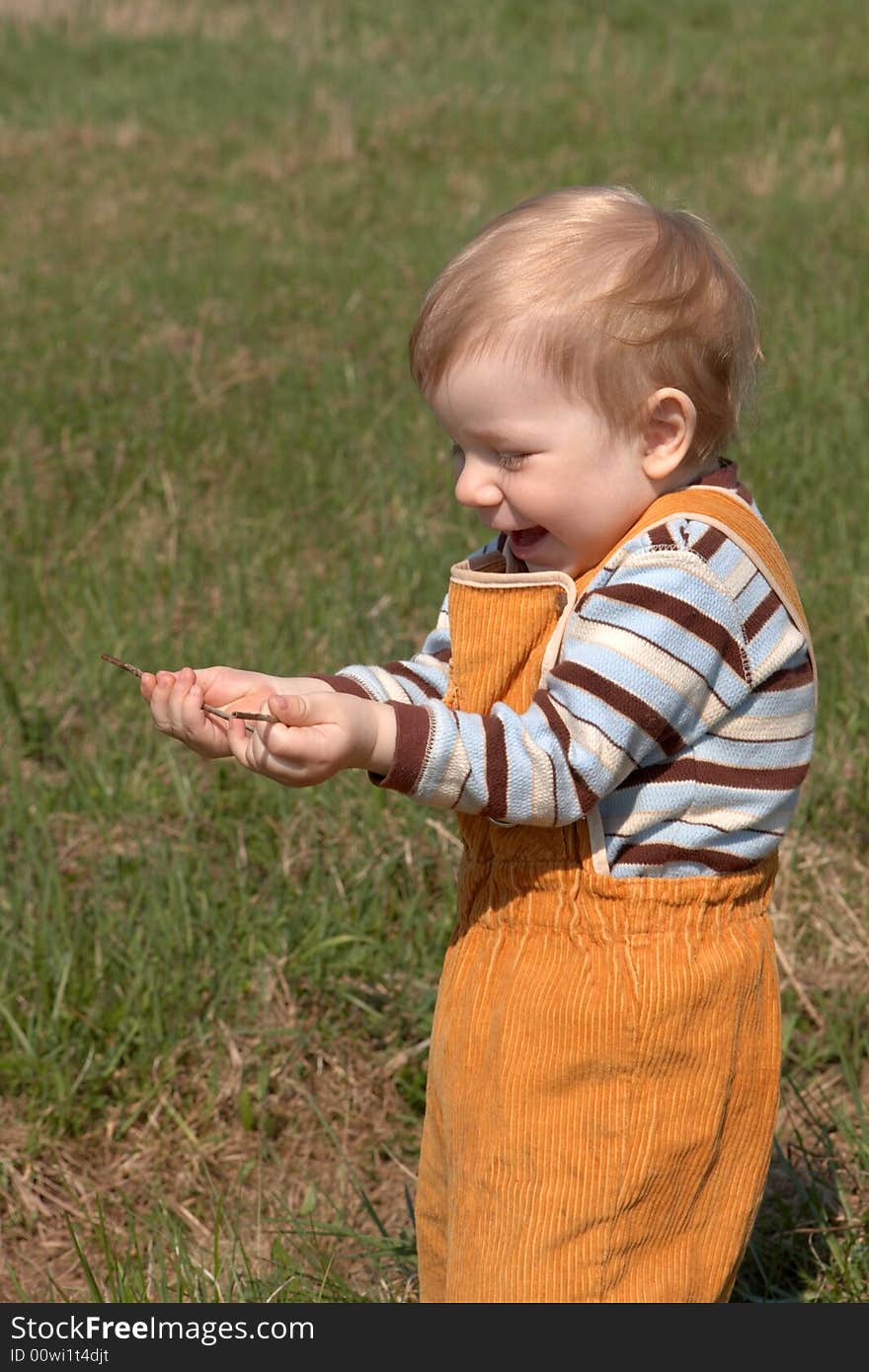 Young boy studies the nature. Young boy studies the nature