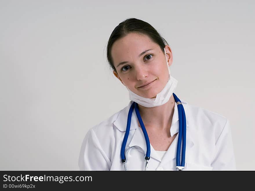 An isolated portrait of a female medical intern. An isolated portrait of a female medical intern.