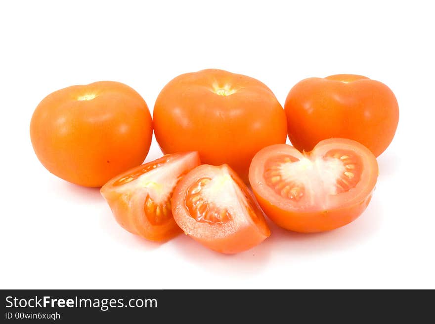 Red tomatoes isolated on white