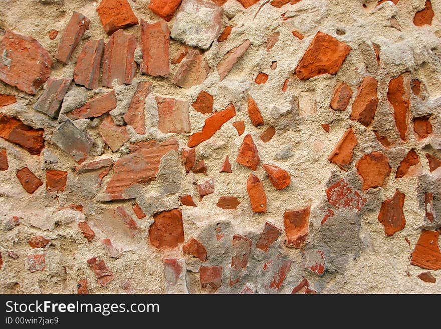 Decaying wall made of concrete and brick