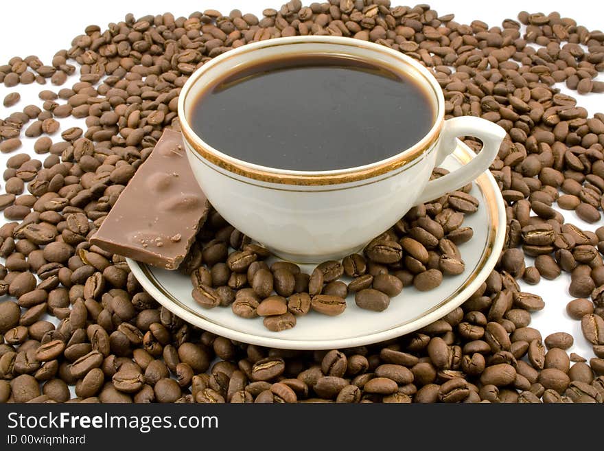 Cup coffee and beans isolated on white