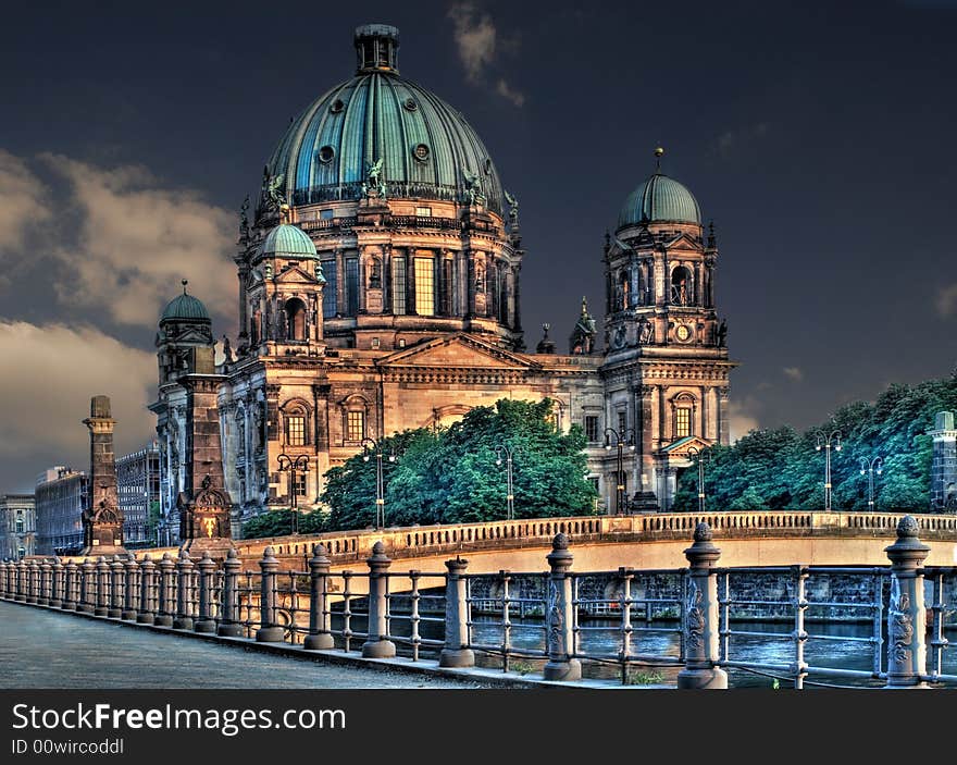 The famous dome in berlin next to the river spree. The famous dome in berlin next to the river spree