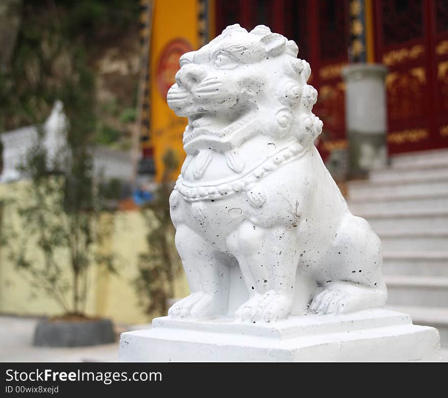 This is a stone lion,it stands in front of a temple for many years!. This is a stone lion,it stands in front of a temple for many years!