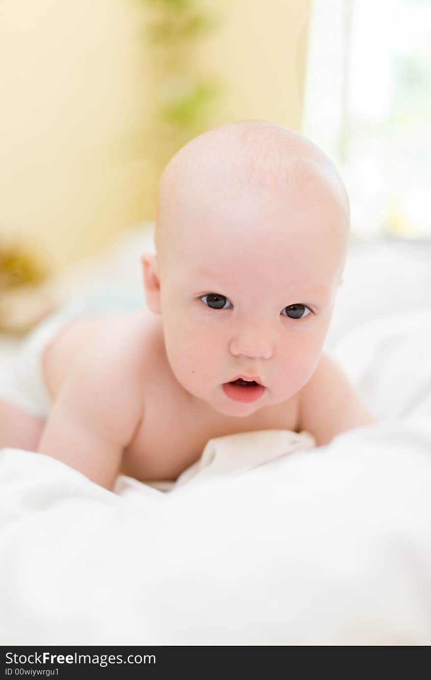 Baby Crawling On Bed