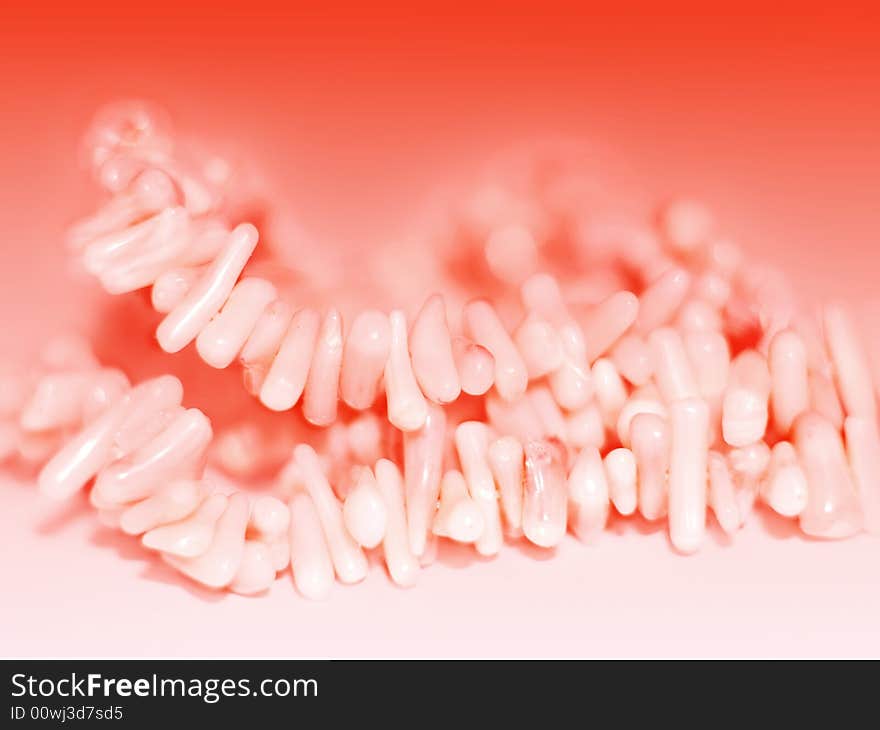 Natural coral beads, close-up, fading to soft-focused area