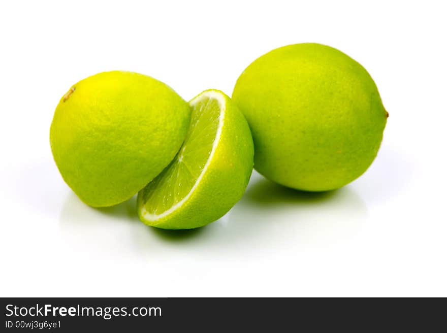 Lime fruit isolated against a white background. Lime fruit isolated against a white background