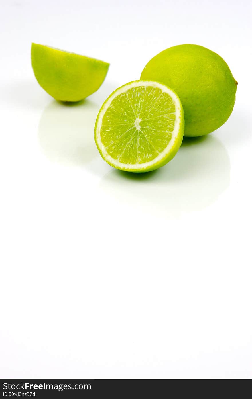 Lime fruit isolated against a white background. Lime fruit isolated against a white background