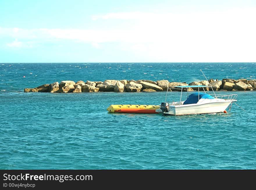 The boat in the sea.