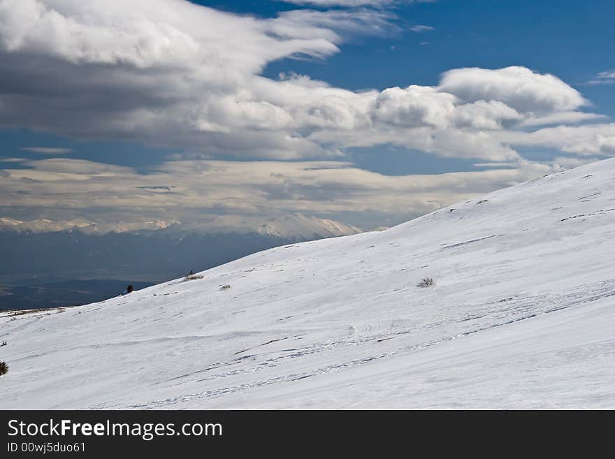 Mountain slopes with snow