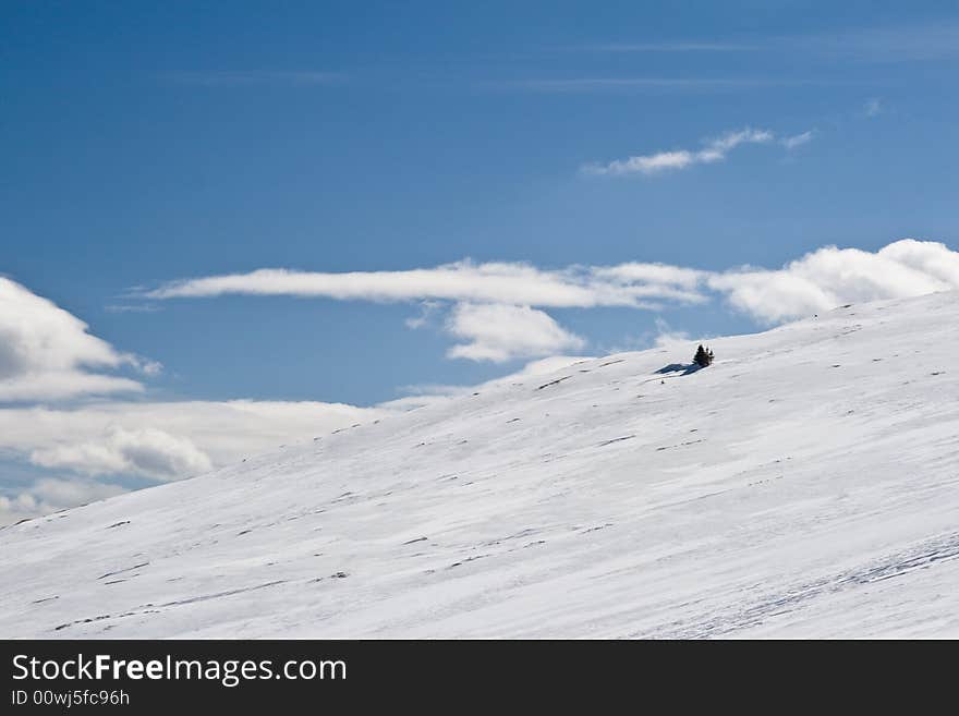 Mountain slopes with snow