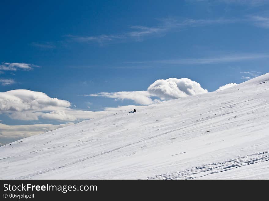 Mountain slopes with snow