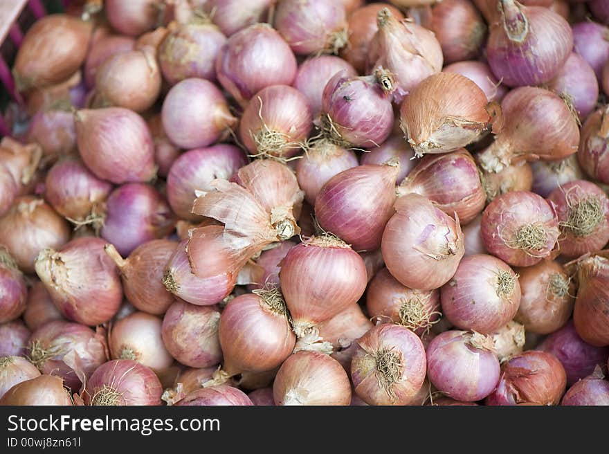 Pile of onions on a market