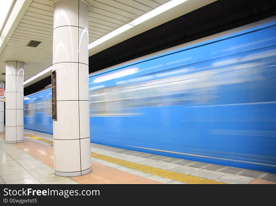 A long time shutter speed photograph of a underground train passing by the station in Tokyo. A long time shutter speed photograph of a underground train passing by the station in Tokyo.