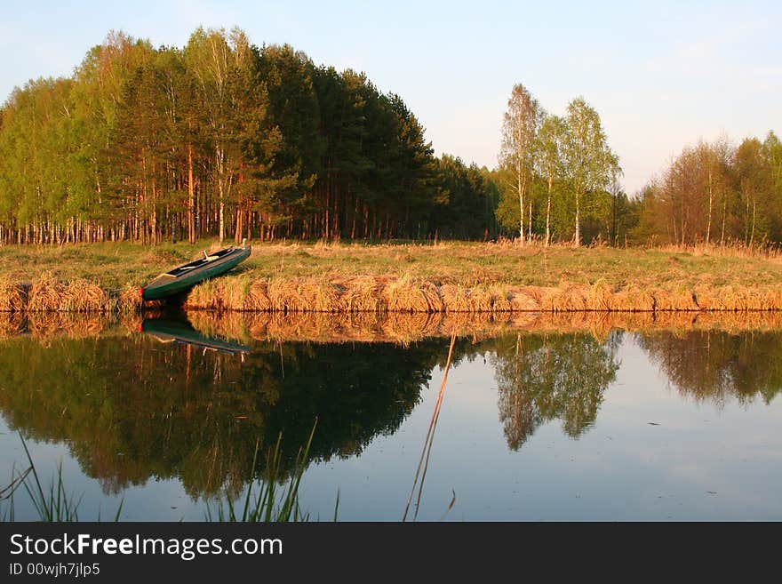 Kayak on the bank of the lake