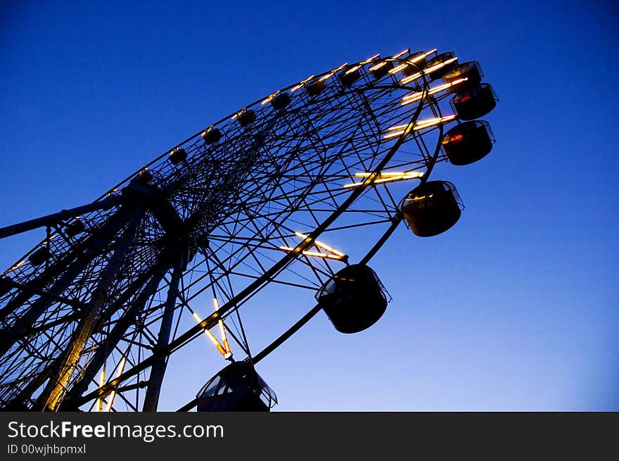 Ferris wheel active happy joy kids local park play postcard postcards  speed spin thrill turn blue cabins carnival  colors colourful beautiful big