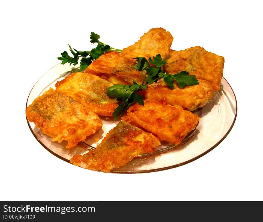 Isolated transparent plate with two roasted fishes.