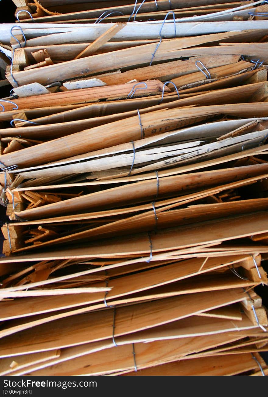 Stacked wooden produce boxes ready for recycling make an interesting background. Stacked wooden produce boxes ready for recycling make an interesting background.