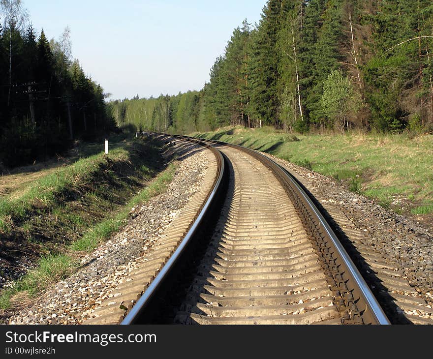 Railway track in the forest, Russia