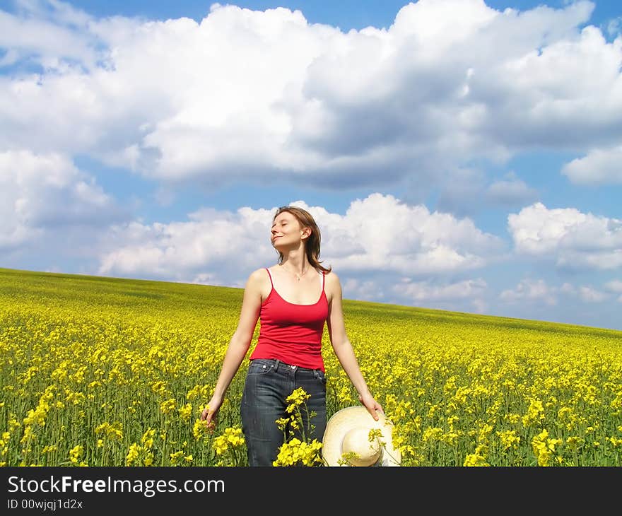 Beautiful young girl enjoying summer sun