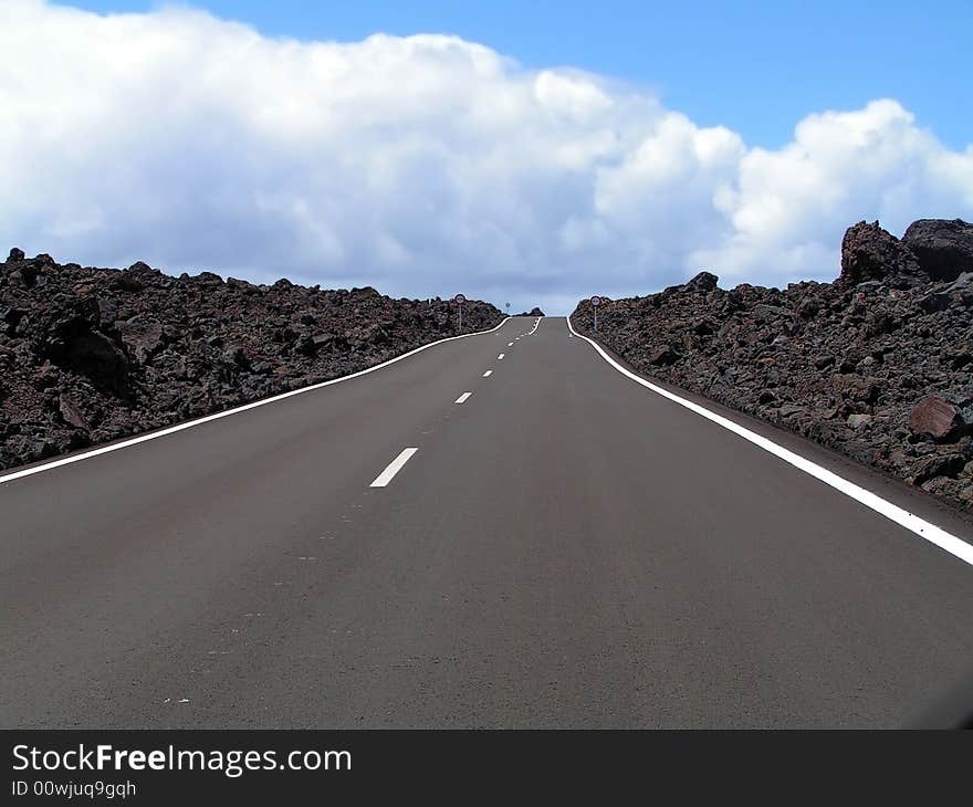 Road through the lava rocks. Lanzarote Canary