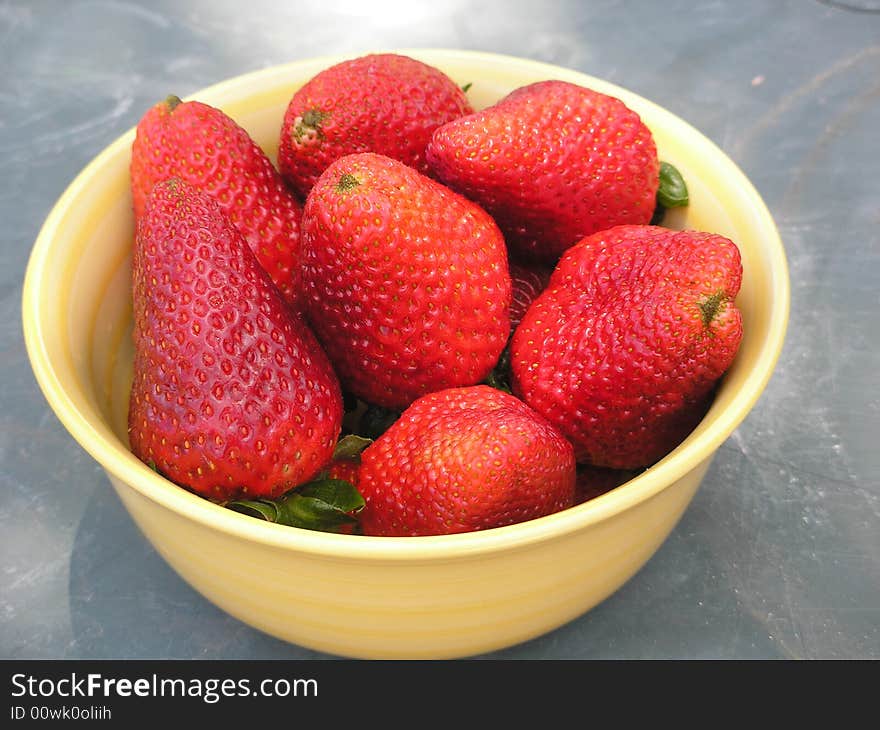 Closeup shot of a bowl of fresh strawberries. Closeup shot of a bowl of fresh strawberries.