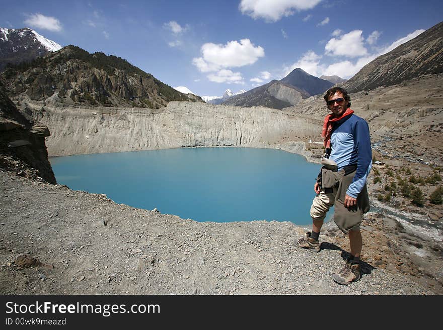 Man standing on the edge of cliff